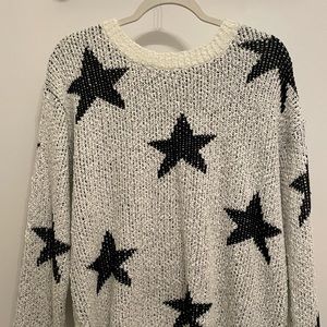 Altar’d state white sweater with black stars! Worn only once.